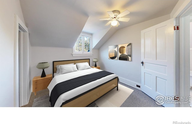 bedroom featuring ceiling fan, carpet floors, and vaulted ceiling