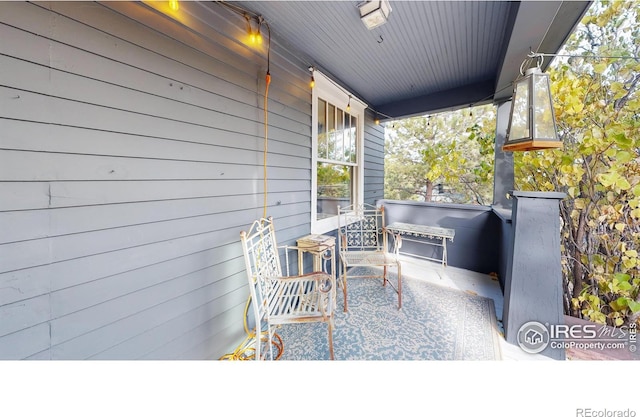 view of patio featuring a porch