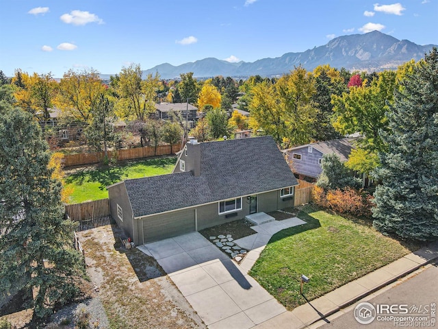 birds eye view of property featuring a mountain view