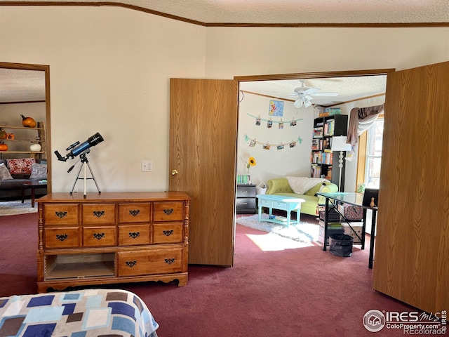 bedroom featuring a textured ceiling, dark carpet, and ornamental molding