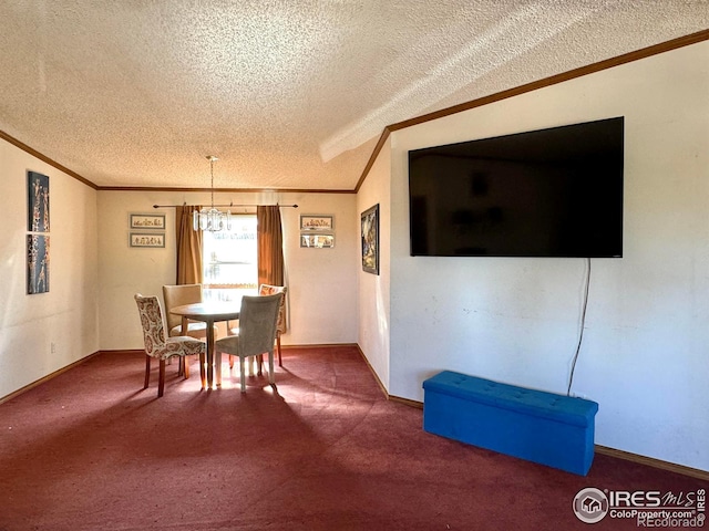 4393 Green Mountain Dr, Livermore, CO 80536 - carpeted dining space with a textured ceiling, a chandelier, crown molding, and baseboards