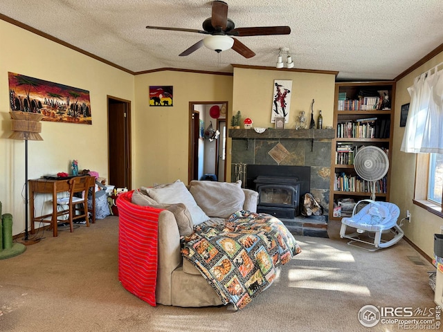 living room with carpet, a textured ceiling, vaulted ceiling, and ceiling fan