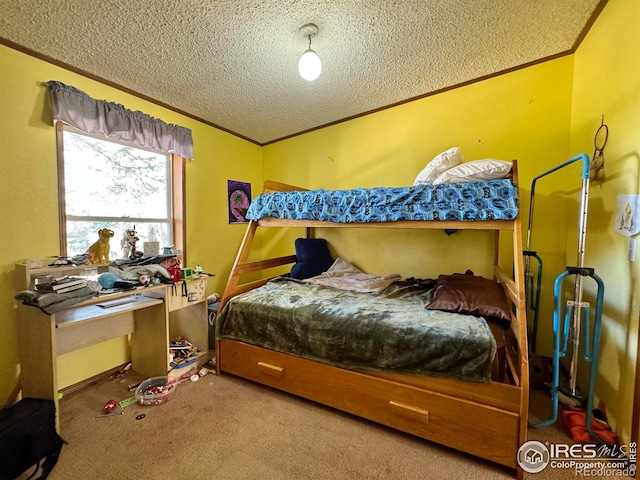 carpeted bedroom featuring a textured ceiling and ornamental molding