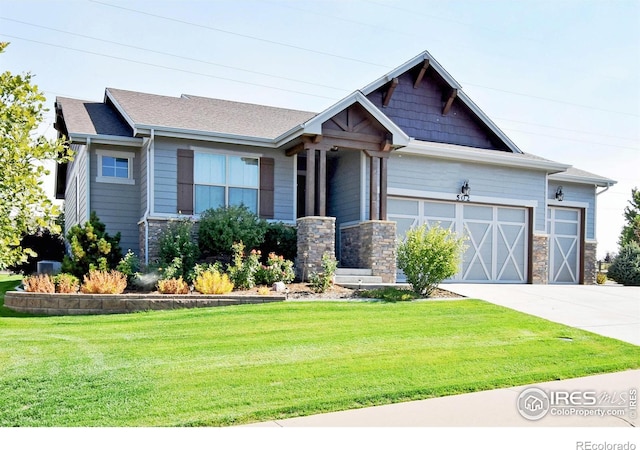 craftsman-style home with a front yard and a garage