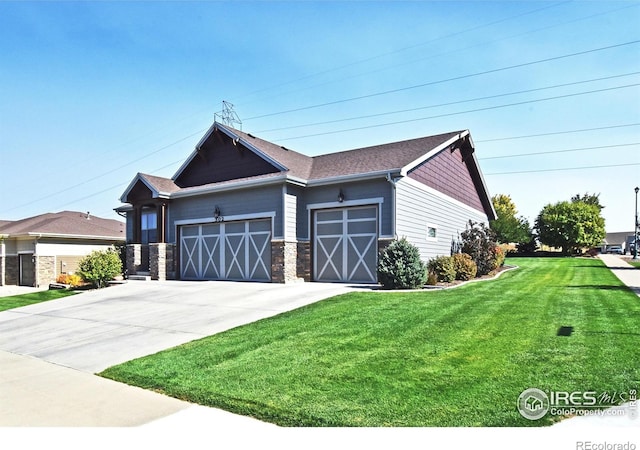 exterior space with a yard and a garage