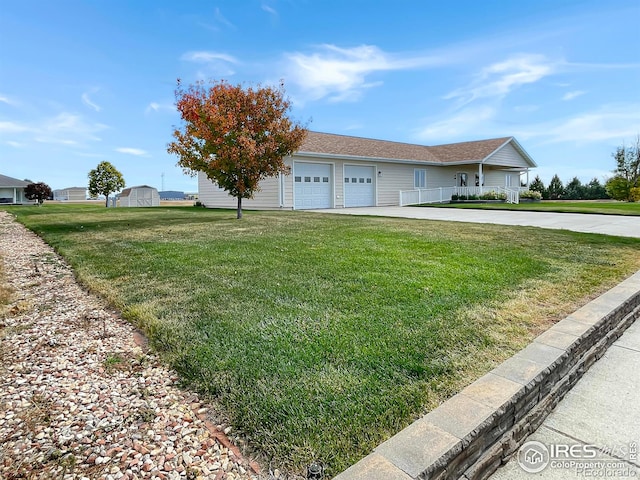 single story home with a front lawn and a garage