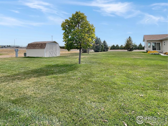 1241 S Sherman Ave, Holyoke, CO 80734 - view of yard featuring a shed and an outbuilding