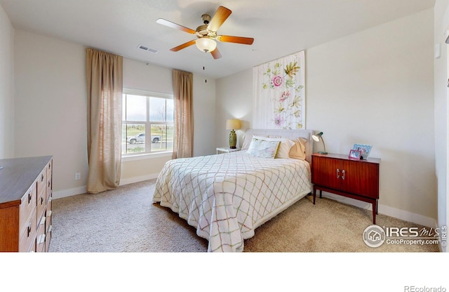 6634 Crystal Downs Dr Unit 104, Windsor, CO 80550 - bedroom with carpet, ceiling fan, and baseboards