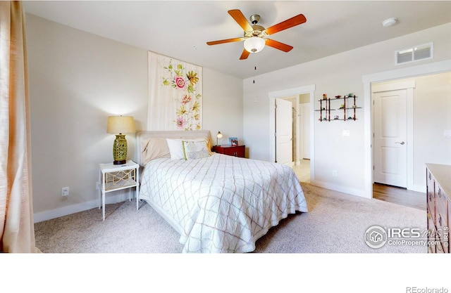 6634 Crystal Downs Dr Unit 104, Windsor, CO 80550 - carpeted bedroom featuring baseboards and ceiling fan