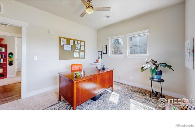 office area with light wood-type flooring and ceiling fan