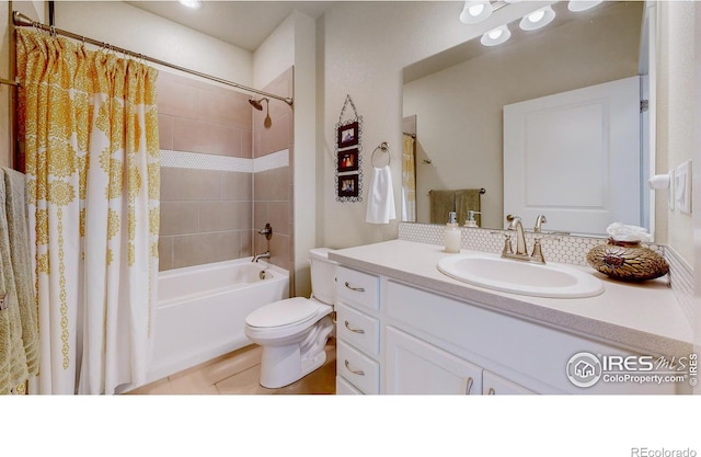 6634 Crystal Downs Dr Unit 104, Windsor, CO 80550 - full bathroom featuring toilet, shower / tub combo with curtain, vanity, and tile patterned flooring
