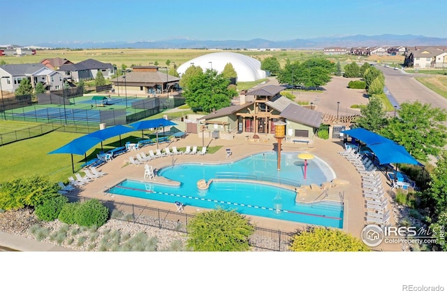 6634 Crystal Downs Dr Unit 104, Windsor, CO 80550 - community pool with a residential view and a mountain view