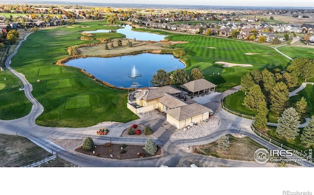 6634 Crystal Downs Dr Unit 104, Windsor, CO 80550 - aerial overview of property's location featuring nearby suburban area, a large body of water, and a golf course