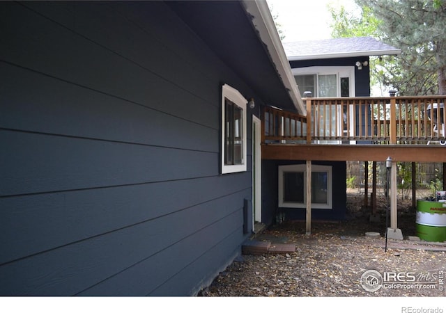 view of home's exterior with a deck