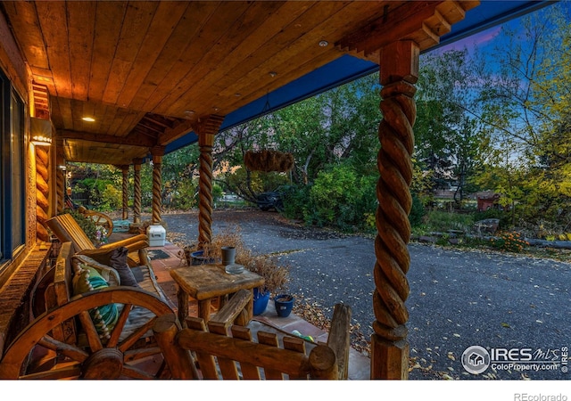 view of patio terrace at dusk