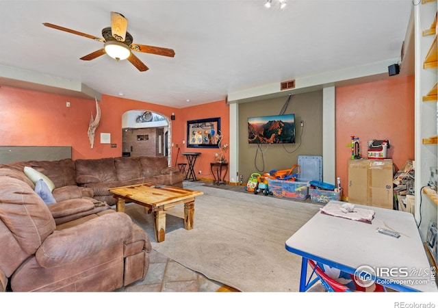 living room with ceiling fan