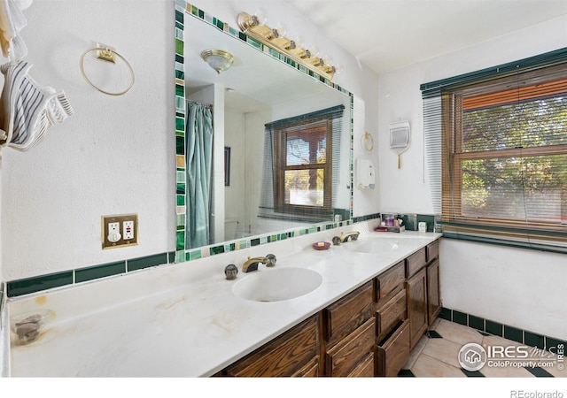 bathroom featuring vanity and tile patterned floors