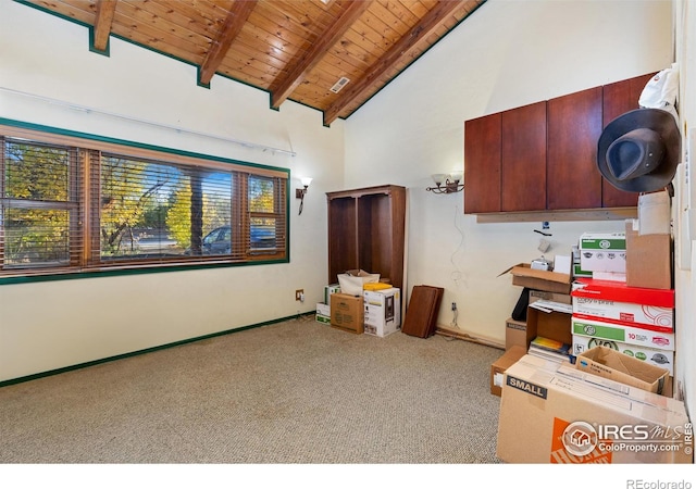 kitchen featuring light carpet, wood ceiling, beamed ceiling, and high vaulted ceiling