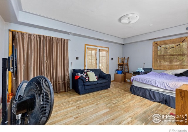 bedroom with light wood-type flooring