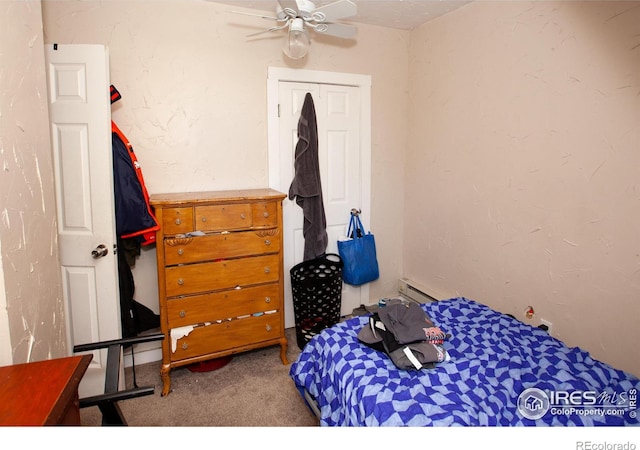 bedroom with ceiling fan and carpet flooring