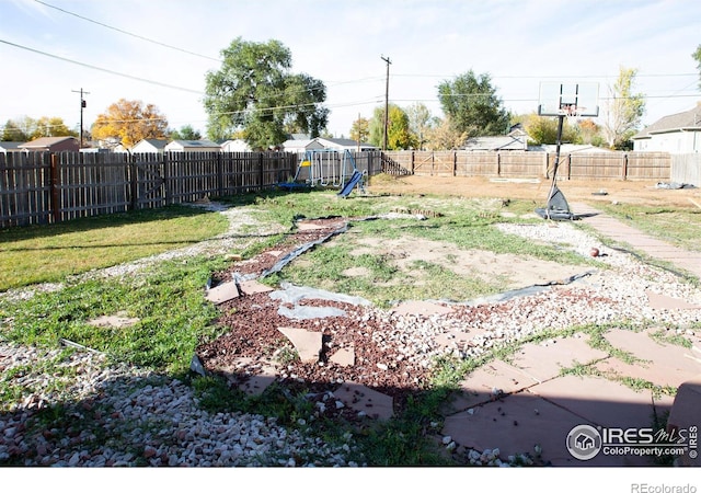 view of yard featuring a playground