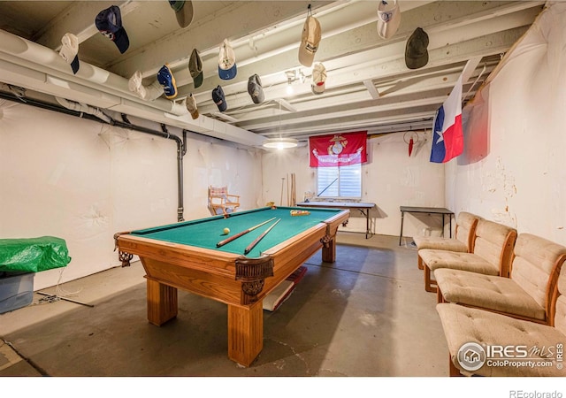 rec room with pool table and concrete flooring