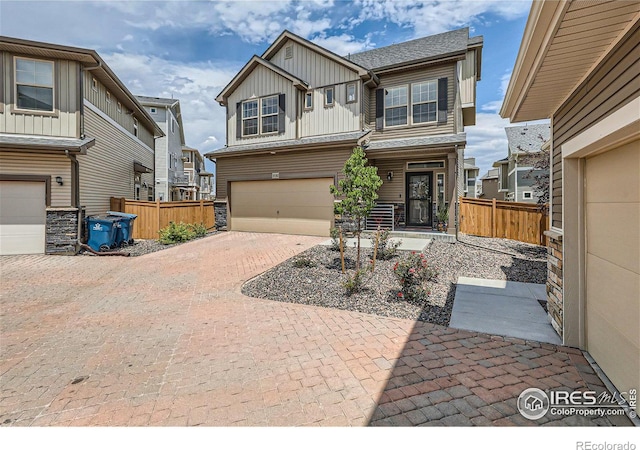 craftsman inspired home with a garage