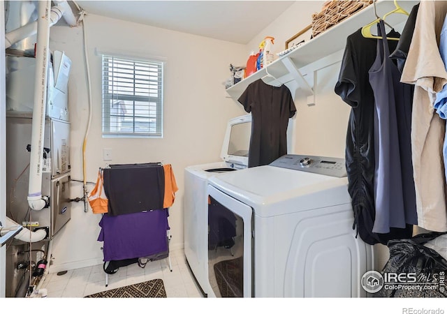 laundry area with washer and clothes dryer