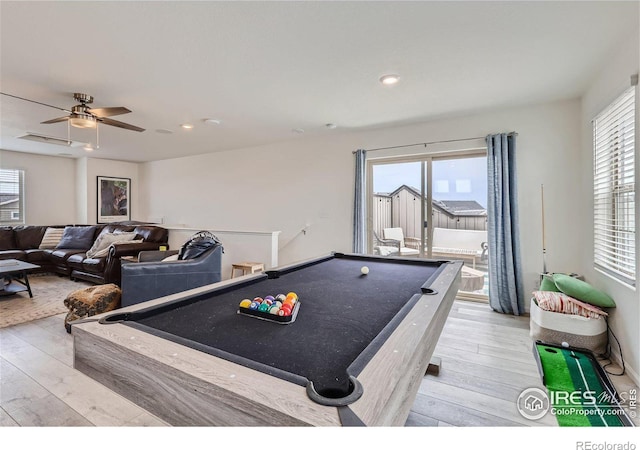 rec room featuring light hardwood / wood-style flooring, pool table, a healthy amount of sunlight, and ceiling fan