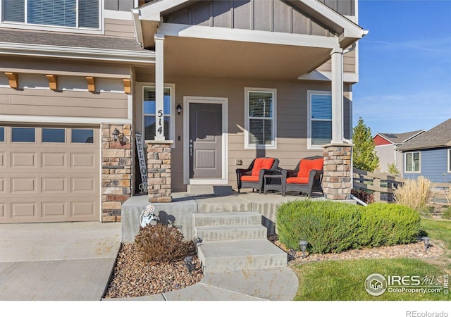 view of exterior entry featuring a garage