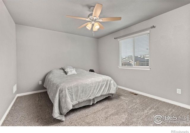 bedroom with carpet and ceiling fan