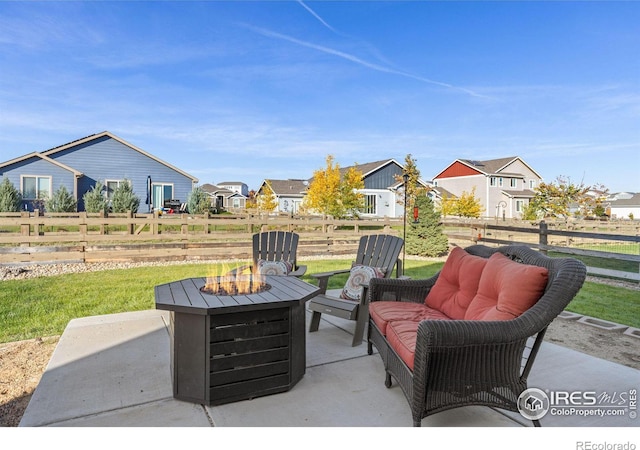 view of patio featuring a fire pit