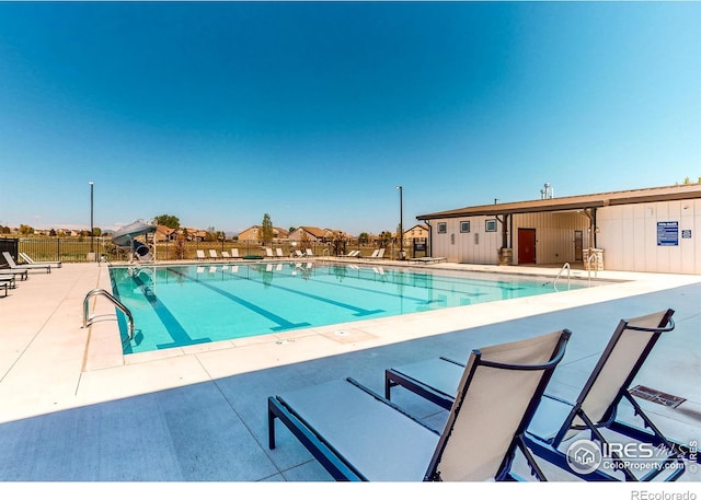 view of pool featuring a patio