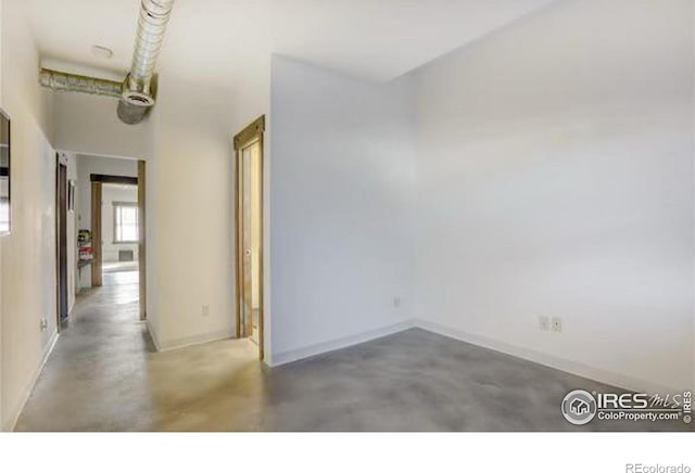 interior space featuring concrete flooring