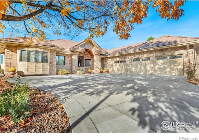 view of front of property with a garage