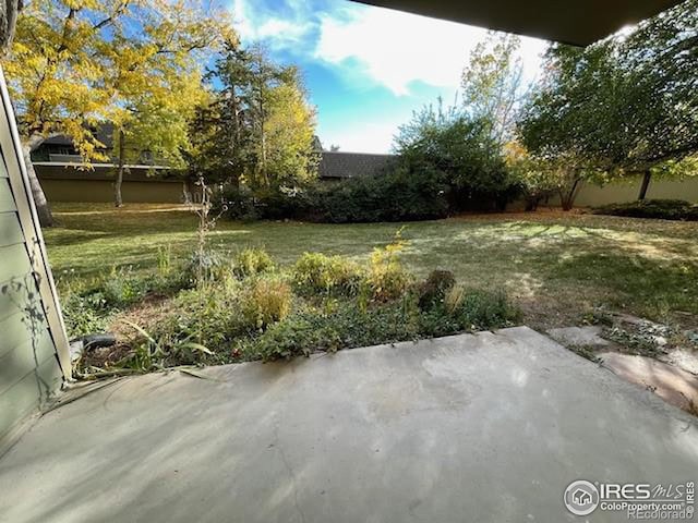 3345 Chisholm Trl Unit 105C, Boulder, CO 80301 - view of grassy yard with a patio area