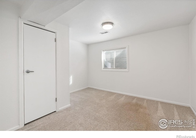 view of carpeted spare room