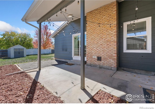 view of patio / terrace with a shed