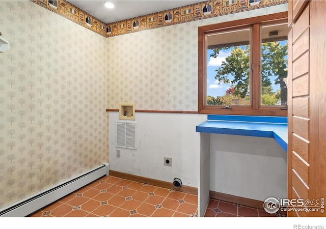 washroom with electric dryer hookup, a baseboard heating unit, and hookup for a washing machine