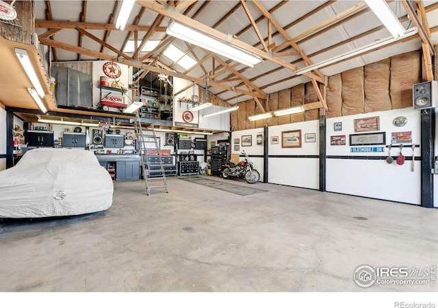 garage with a workshop area