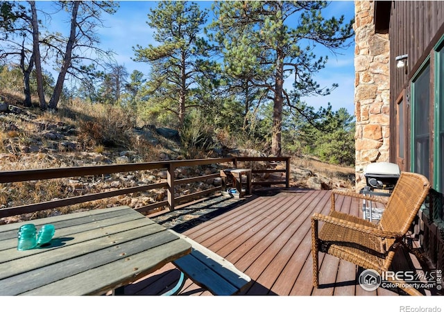 wooden terrace with grilling area