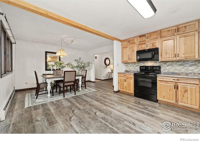 kitchen with light hardwood / wood-style flooring, backsplash, hanging light fixtures, black appliances, and a baseboard radiator