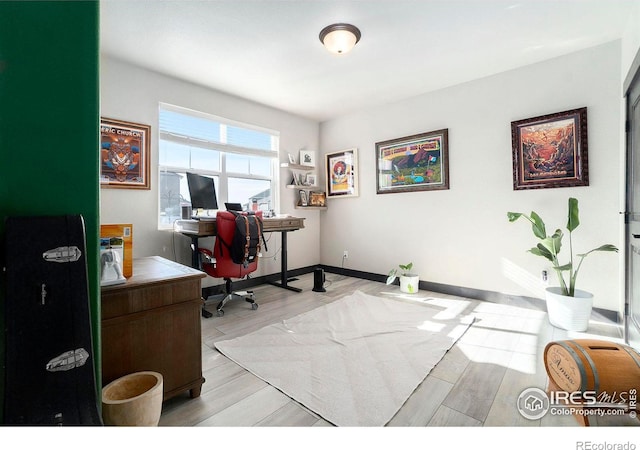 home office featuring light hardwood / wood-style floors