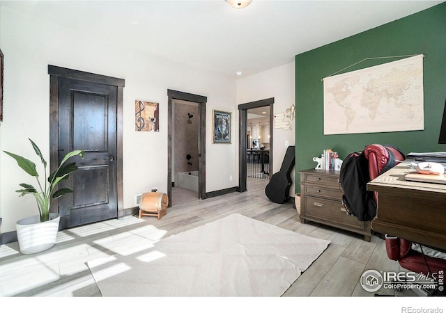 bedroom with light hardwood / wood-style floors