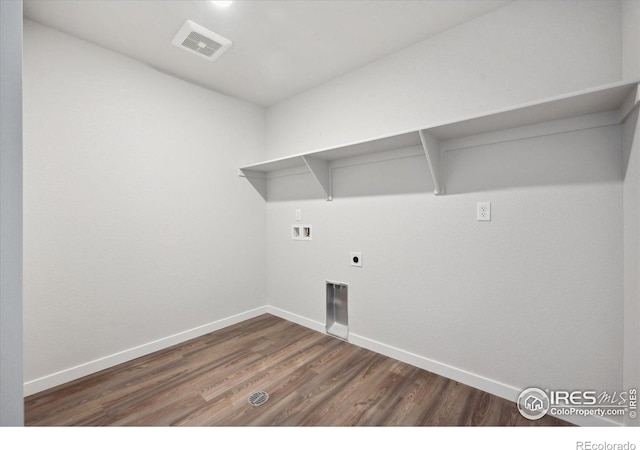 laundry room with washer hookup, dark hardwood / wood-style floors, and hookup for an electric dryer