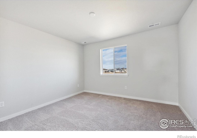 view of carpeted spare room