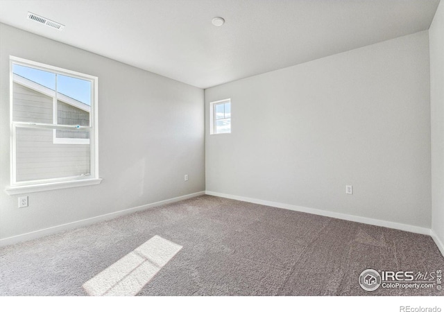 empty room with carpet floors