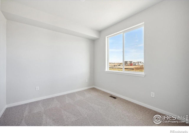 view of carpeted empty room