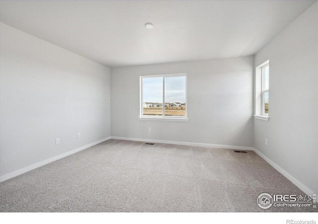 view of carpeted spare room