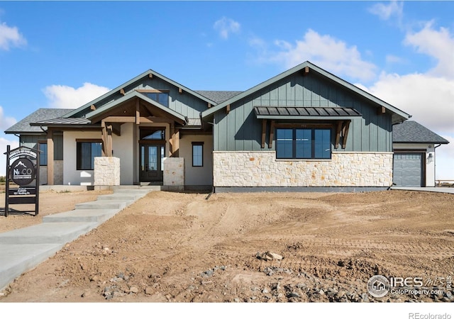 view of front of property with a garage